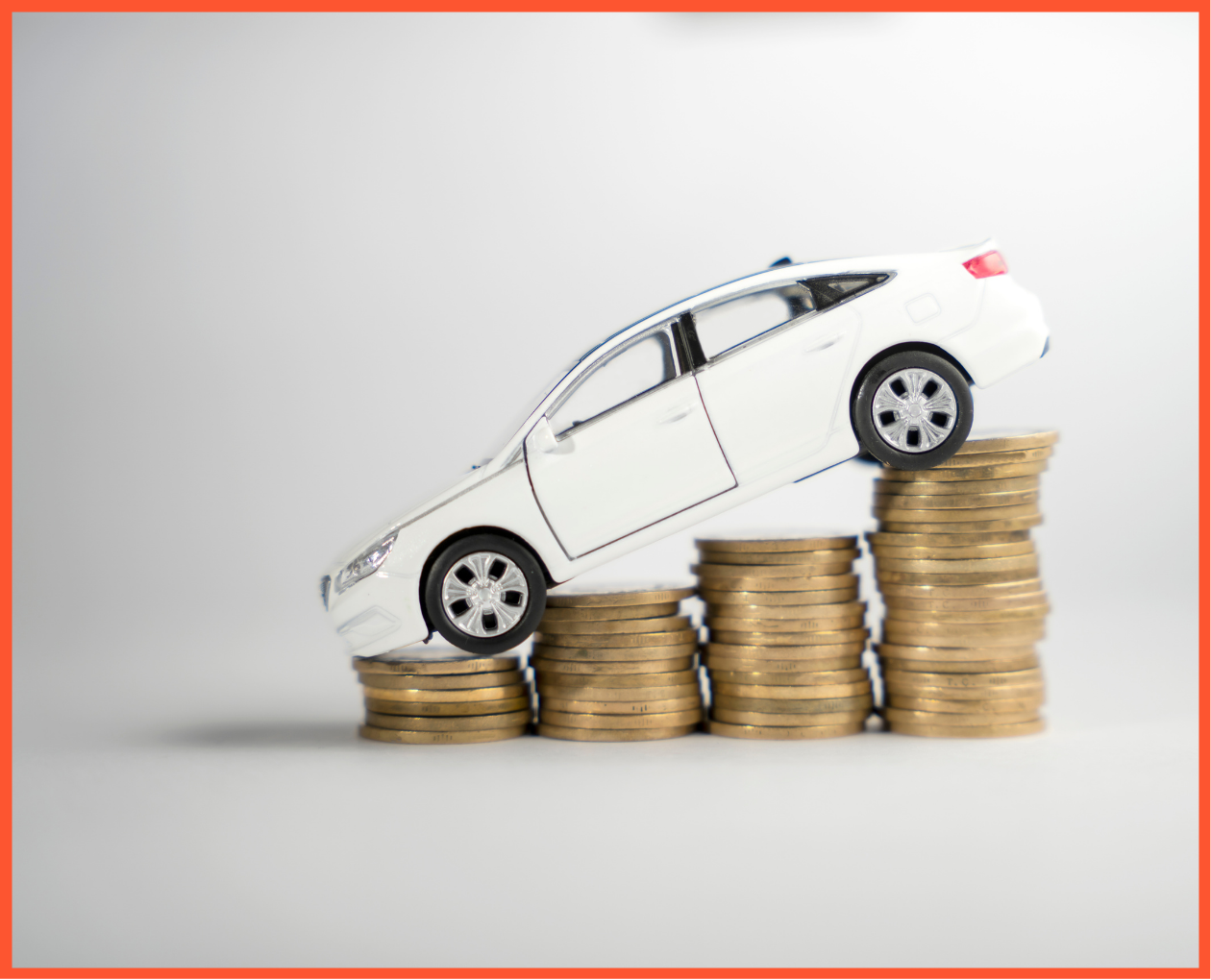 car slanted on mountain of coins and money metaphor for dealership sales