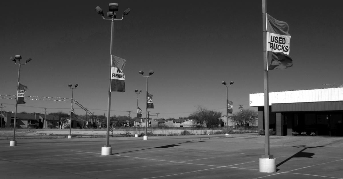 empty car dealership lot
