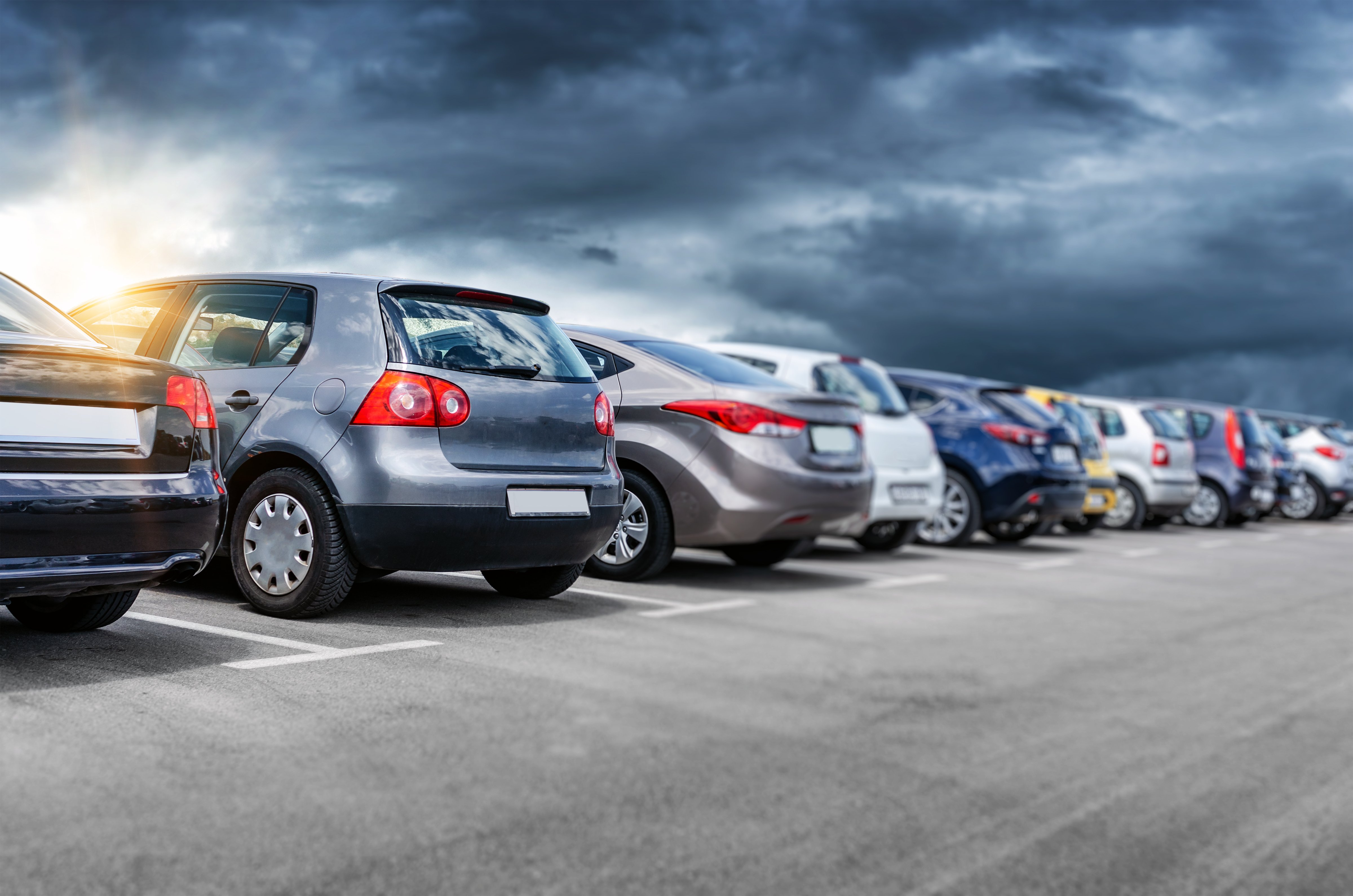 variety of cars at a dealership