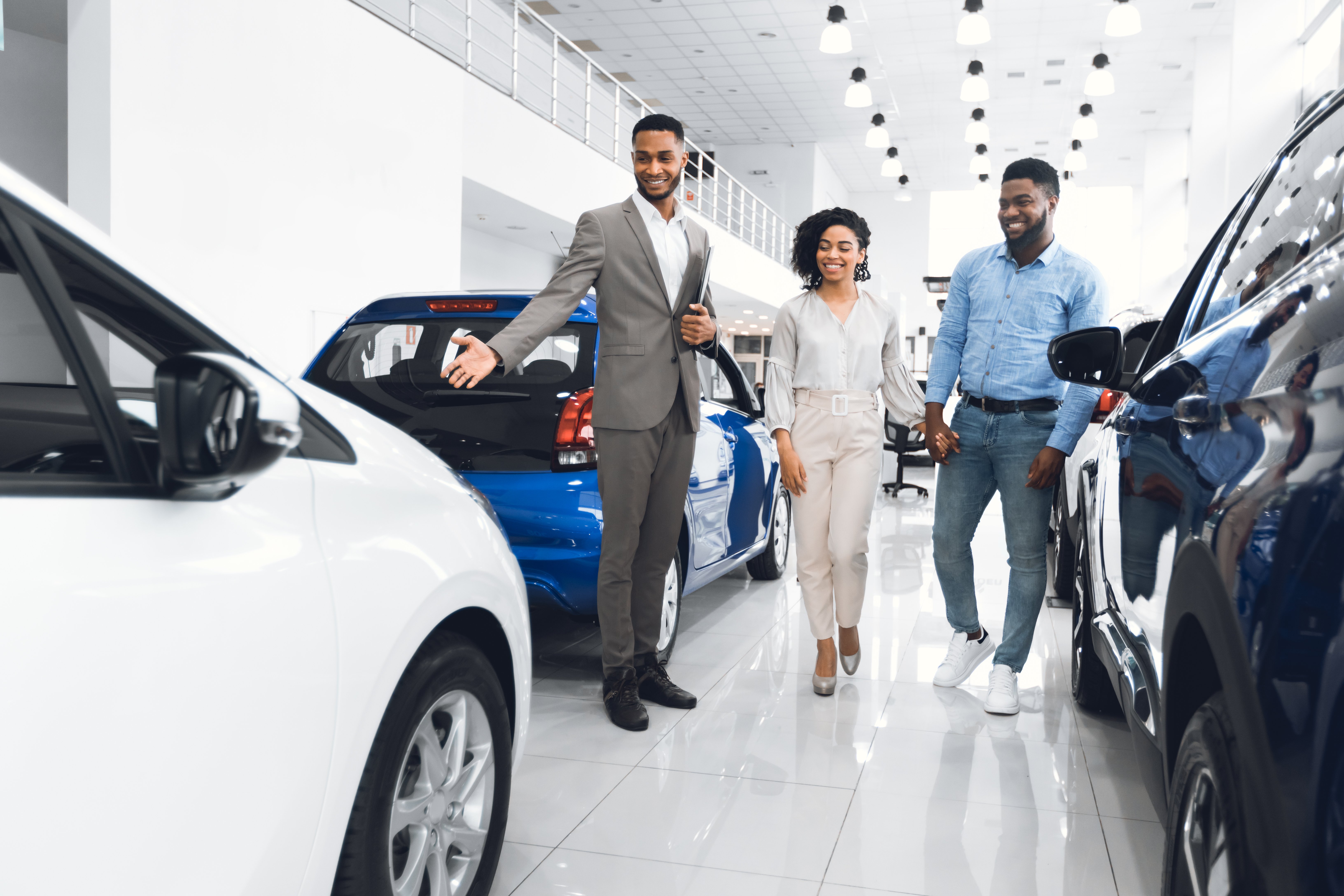 couple car shopping at a dealership