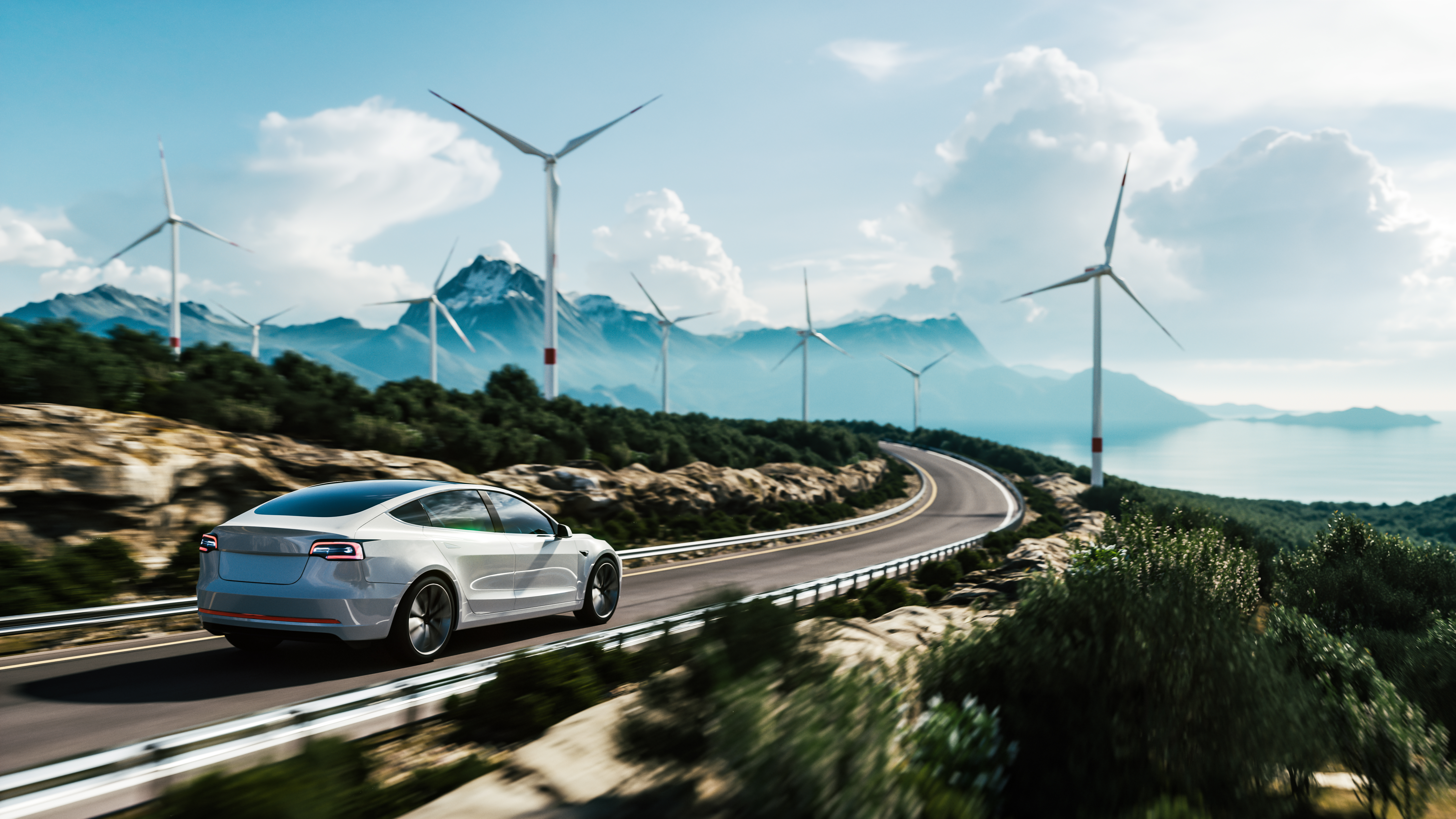 electric car driving down road with windmills